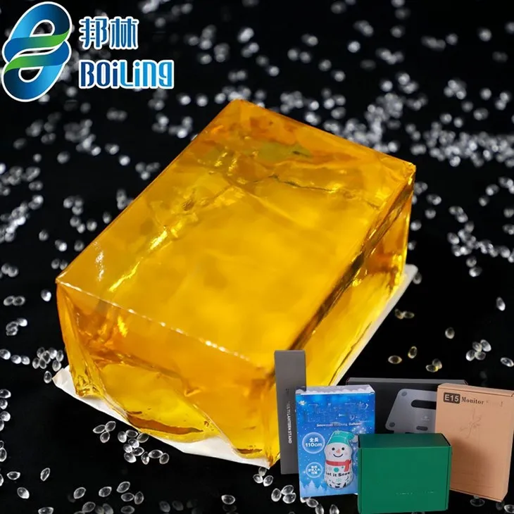 Col·locació de l'adhesiu termofusible per al muntatge de cartró